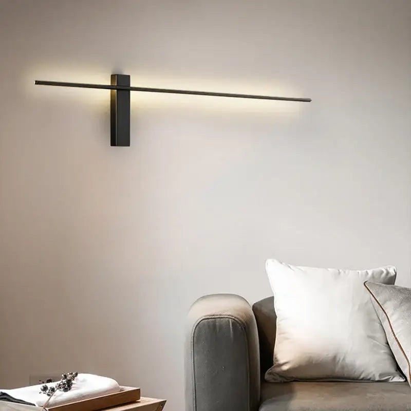 Modern black copper wall lamp with a sleek horizontal LED bar and rectangular base for minimalist bedroom decorbites copper wall lamp