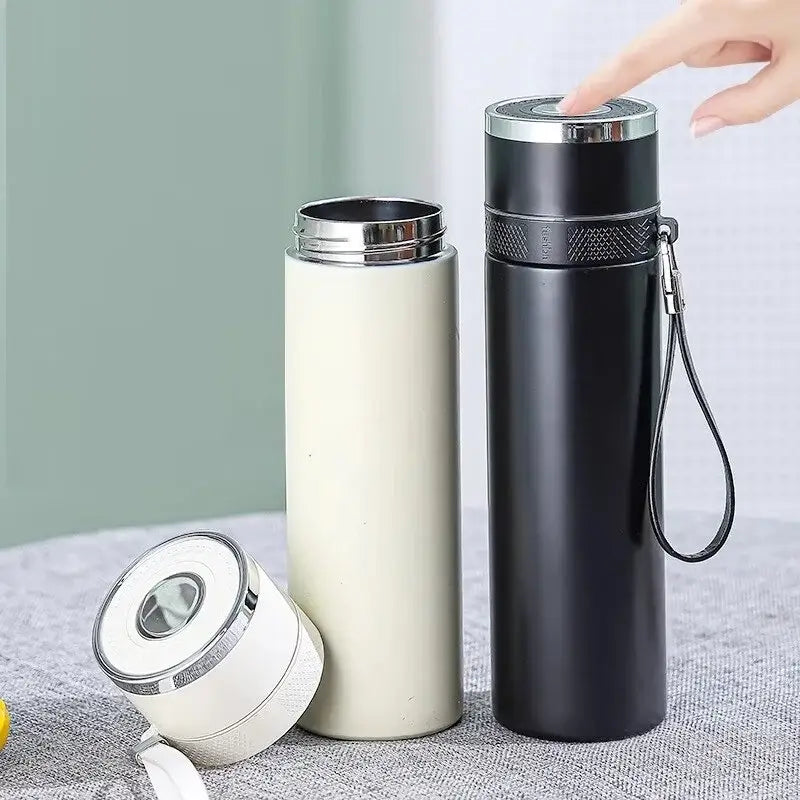 Modern black and cream 400ml stainless steel vacuum tumbler with silver accents and textured grip for travel use