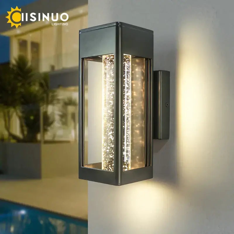 Modern black wall lamp with crystal bubble glass panels and vertical led strips creating a warm decorbites glow
