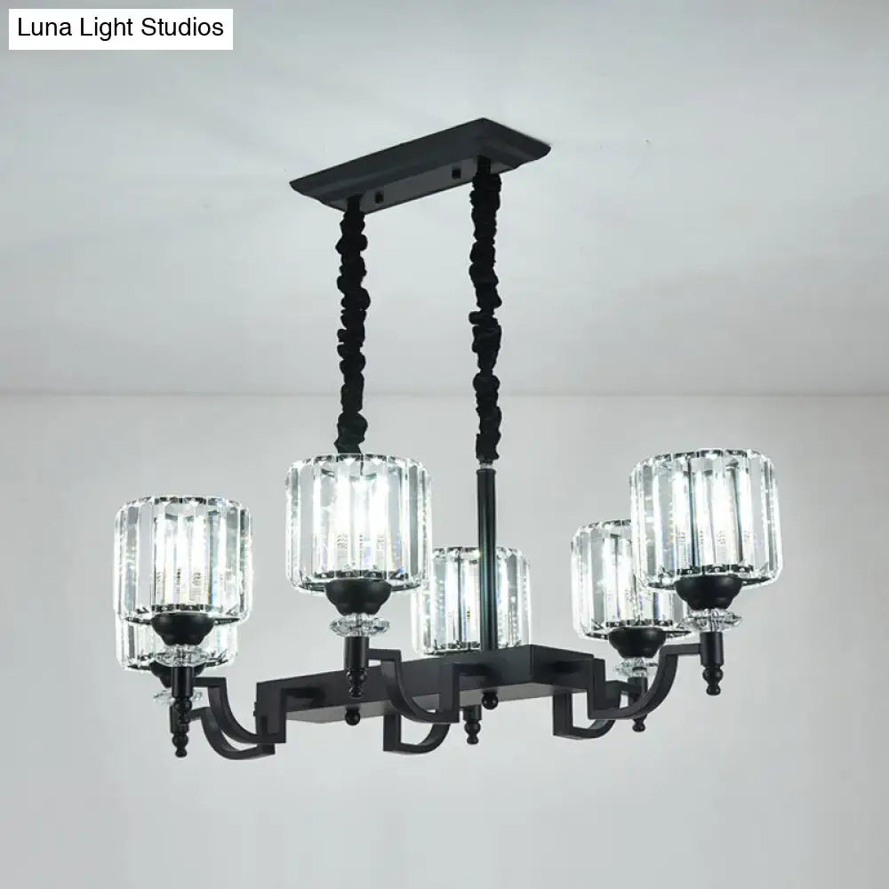 Modern black ceiling light with five clear ribbed glass shades and twisted chains for adjustable cord length suspension