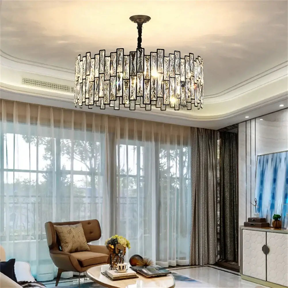 Modern black crystal chandelier with black metal frame and faceted crystal bars in overlapping circular design for dining room