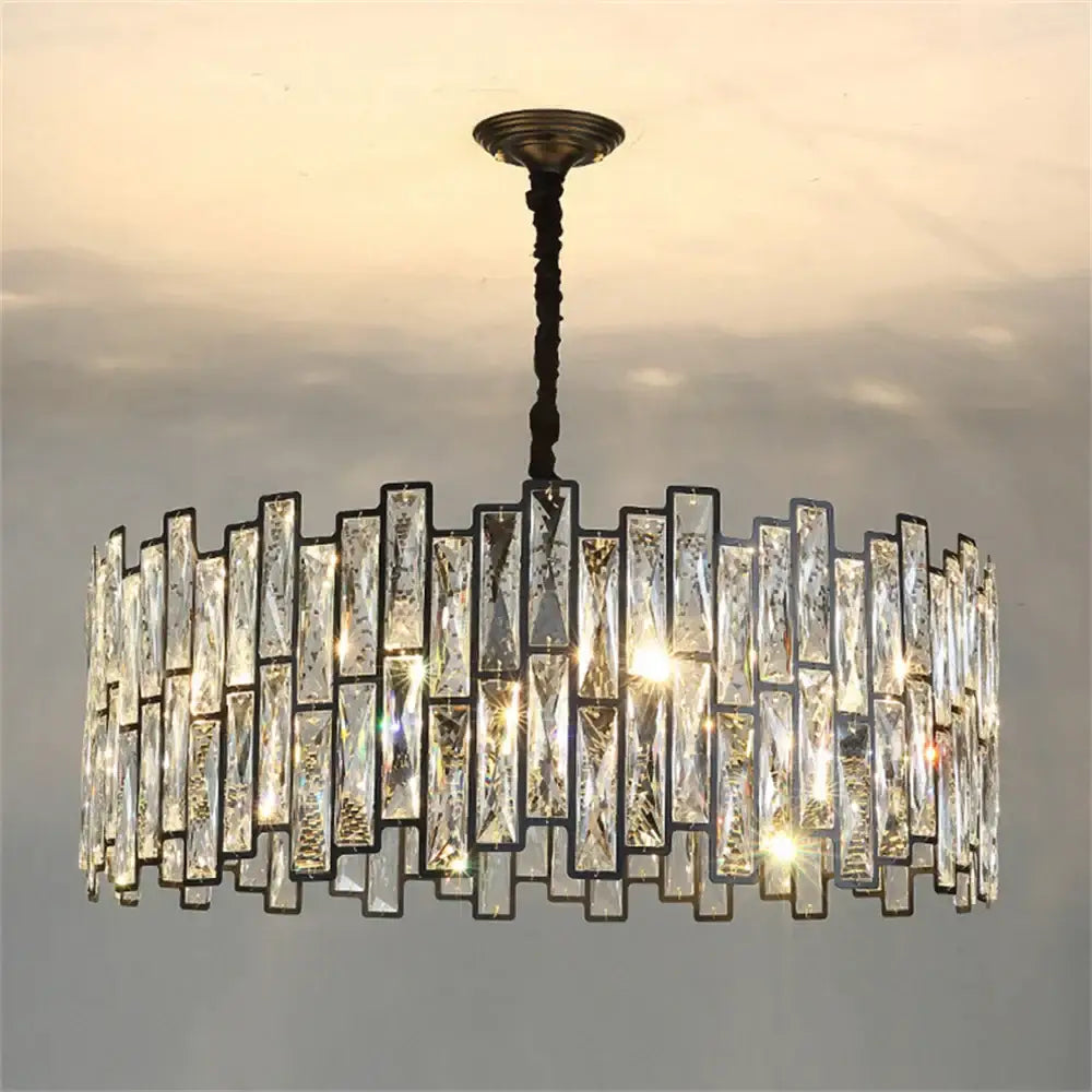 A modern black crystal chandelier with clear faceted crystal bars in dark metal frames for dining room decorbites black crystal