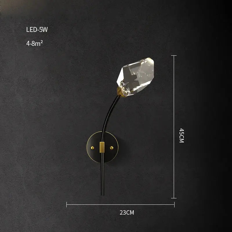 A sleek modern black crystal copper chandelier wall sconce with a gold base and clear faceted crystal bulb for dining room decorbites black crystal