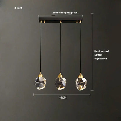 Modern black crystal copper chandelier with three faceted crystal globes and gold-toned fixtures for dining room decorbites black crystal