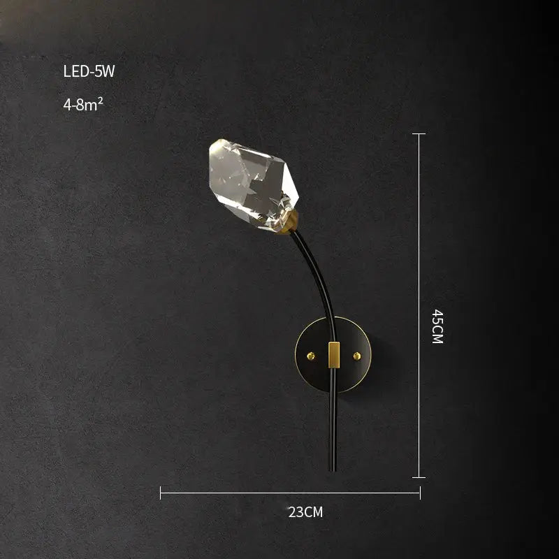 A sleek black crystal copper led wall sconce with faceted clear bulb and gold-toned accents for modern decorbites lighting