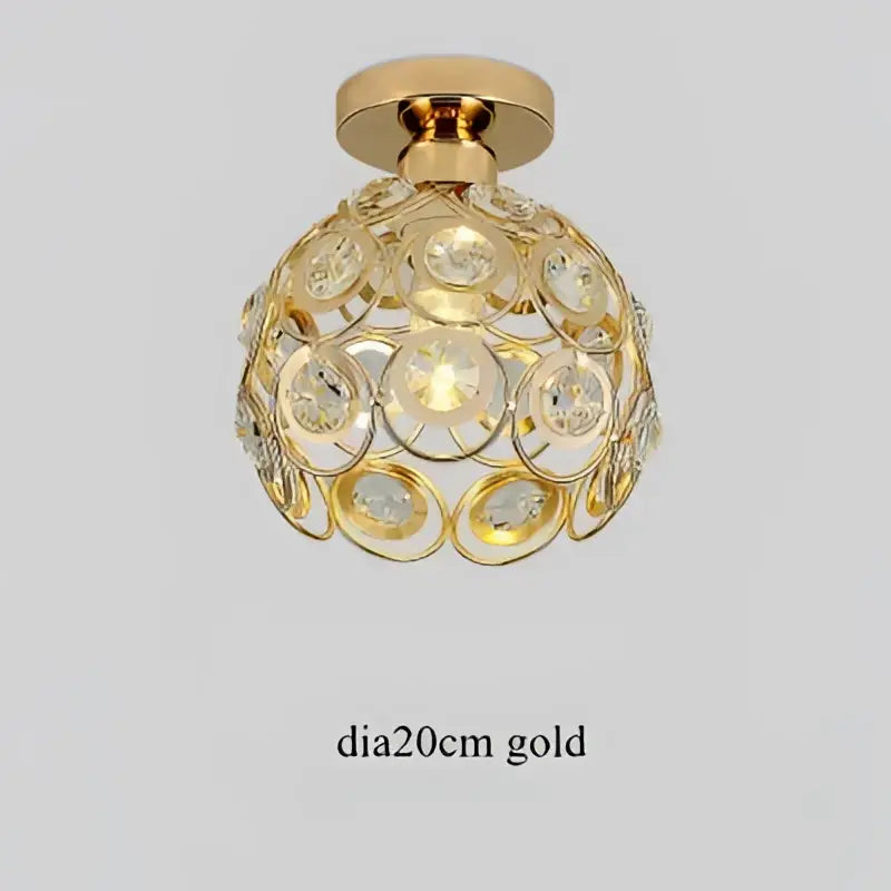 Modern black crystal flush mount ceiling light features a gold spherical fixture with clear crystal flush mount embellishments