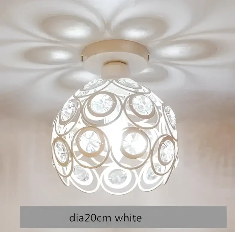Modern black crystal flush mount ceiling light with white spherical design featuring concentric circles and crystal accents