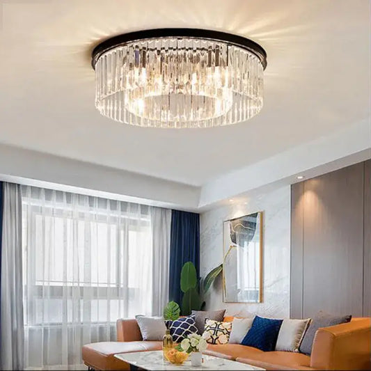 Modern black crystal flush mount ceiling light with circular frame and cascading clear glass prisms decorbites crystal flush