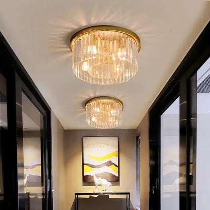 Modern black crystal flush mount ceiling light with gold-toned crystal flush decorbites and cascading glass rods