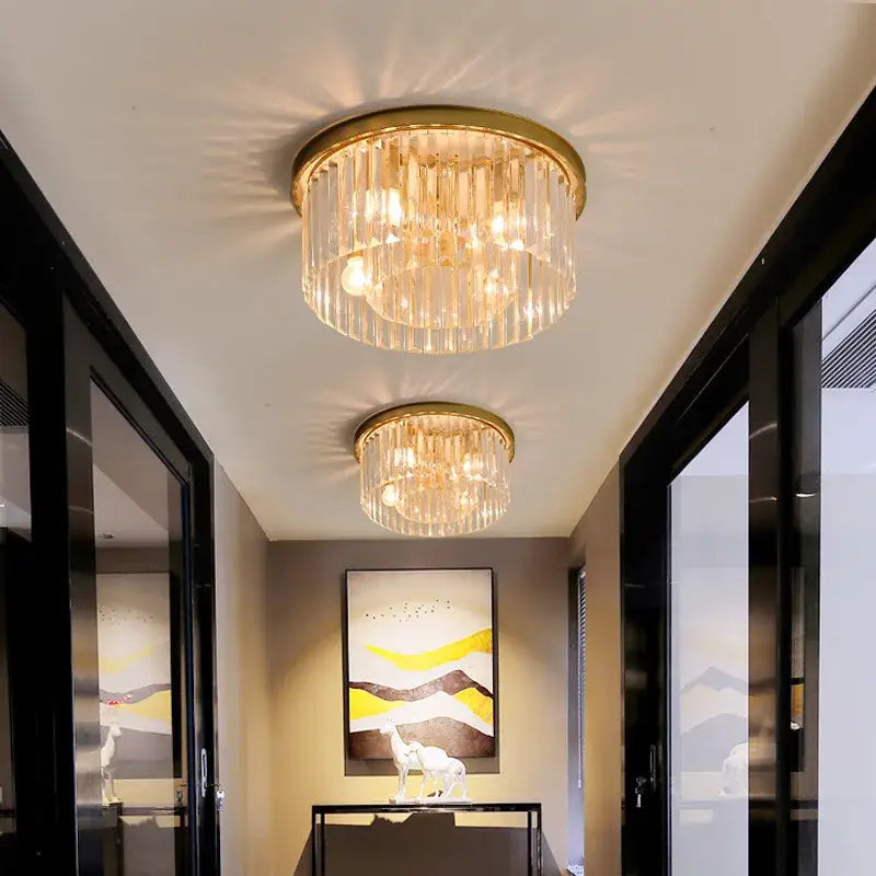 Modern black crystal flush mount ceiling light with gold-toned crystal flush decorbites and cascading glass rods