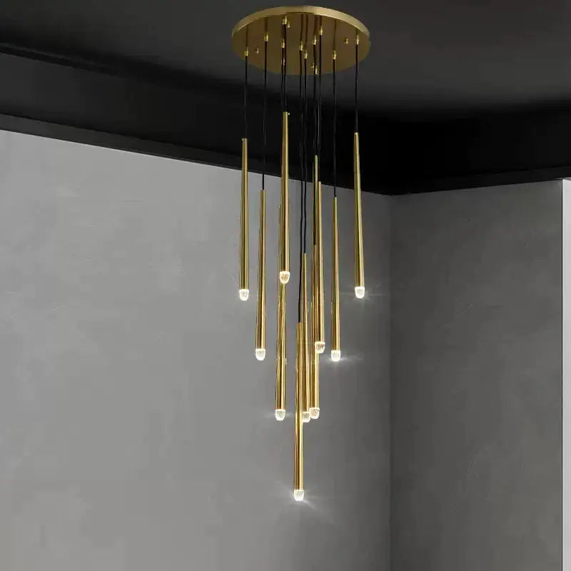 A modern gold-toned crystal led chandelier with slender rods and bulbs for elegant dining room decorbites crystal led lighting