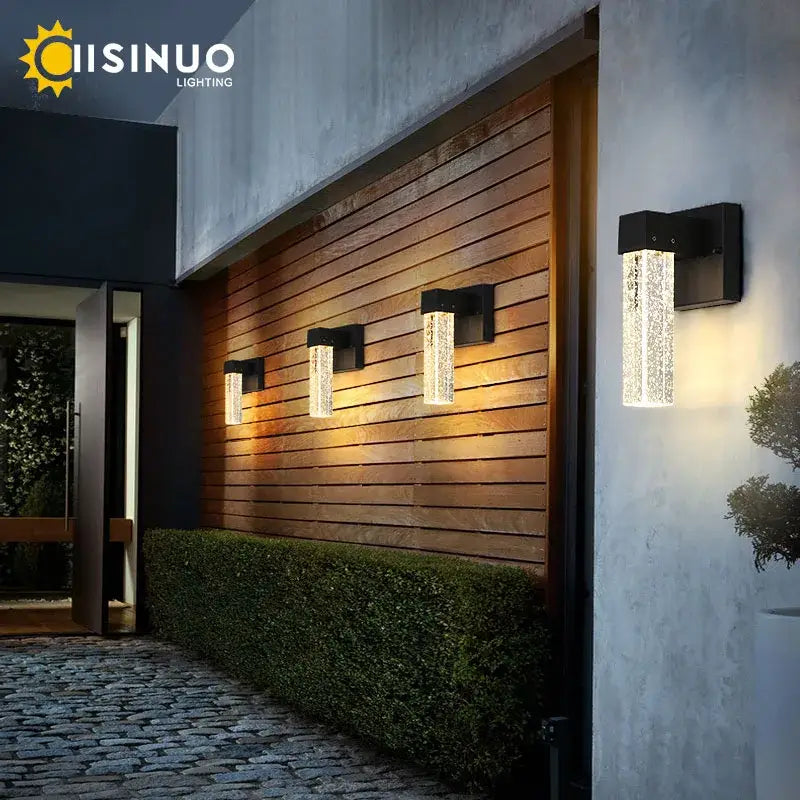 Modern black crystal led outdoor wall light featuring a rectangular sconce with clear textured glass diffuser