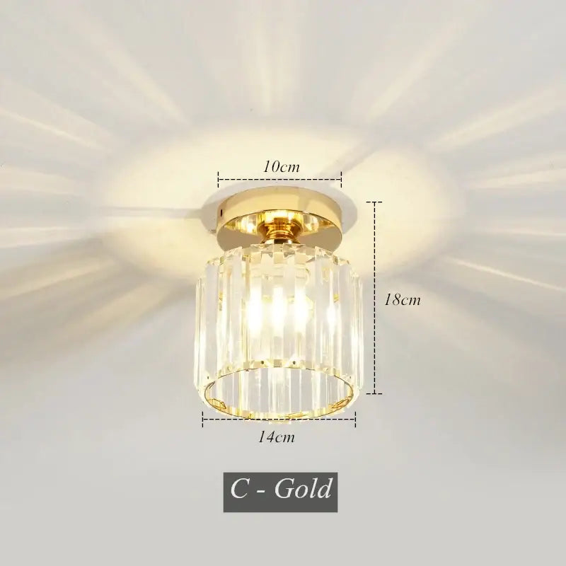 Modern black crystal led pendant chandelier with gold-finished ceiling mount and cylindrical crystal glass shade decorbites crystal led