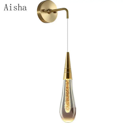 Gold-toned aisha wall lamp with teardrop glass pendant housing golden led beads for modern decorbites crystal led wall decor