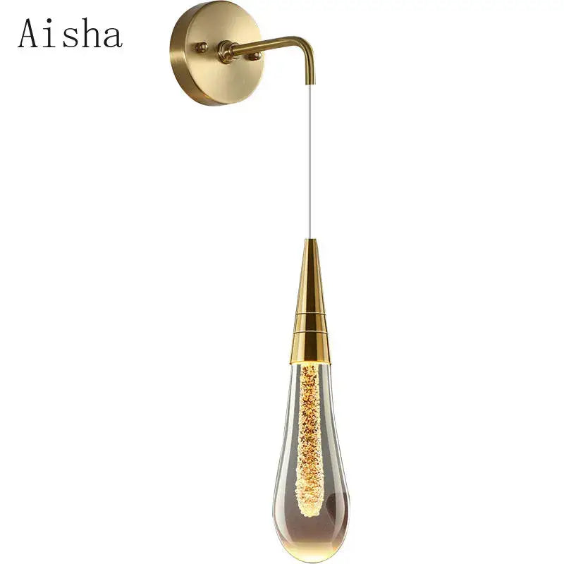 Gold-toned aisha wall lamp with teardrop glass pendant housing golden led beads for modern decorbites crystal led wall decor