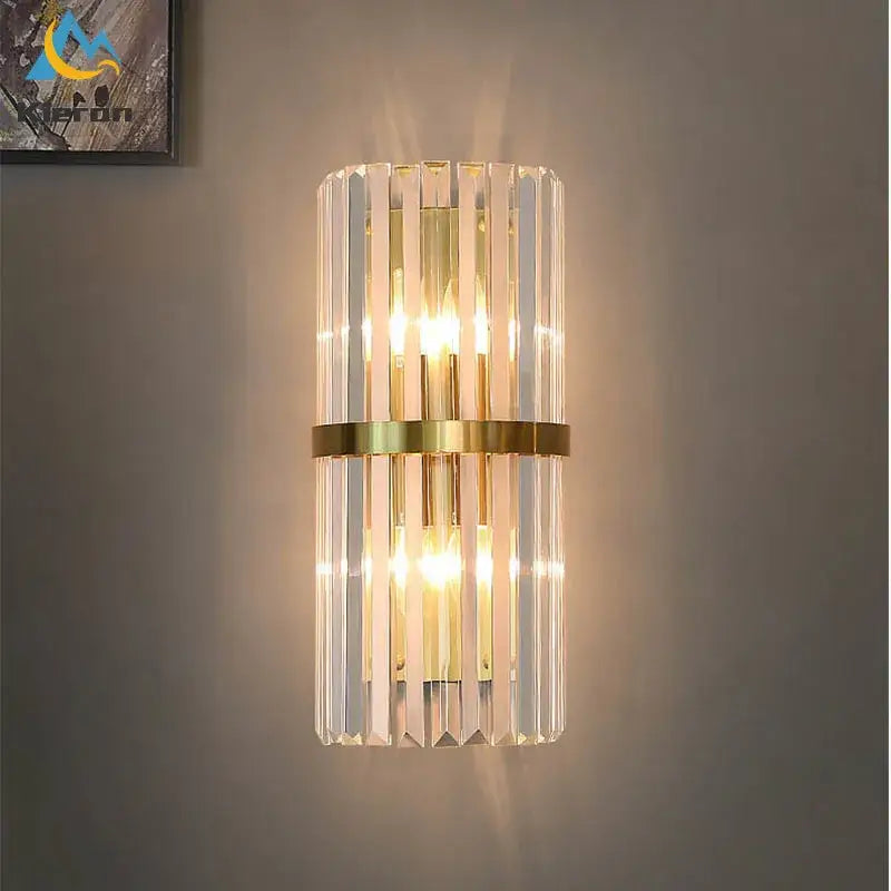 Modern black crystal led wall lights with gold-toned metal frame and vertical crystal rods for elegant bedroom decorbites crystal led