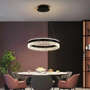 Modern black crystal ring led pendant light with sleek circular design for bedroom lighting decorbites crystal ring