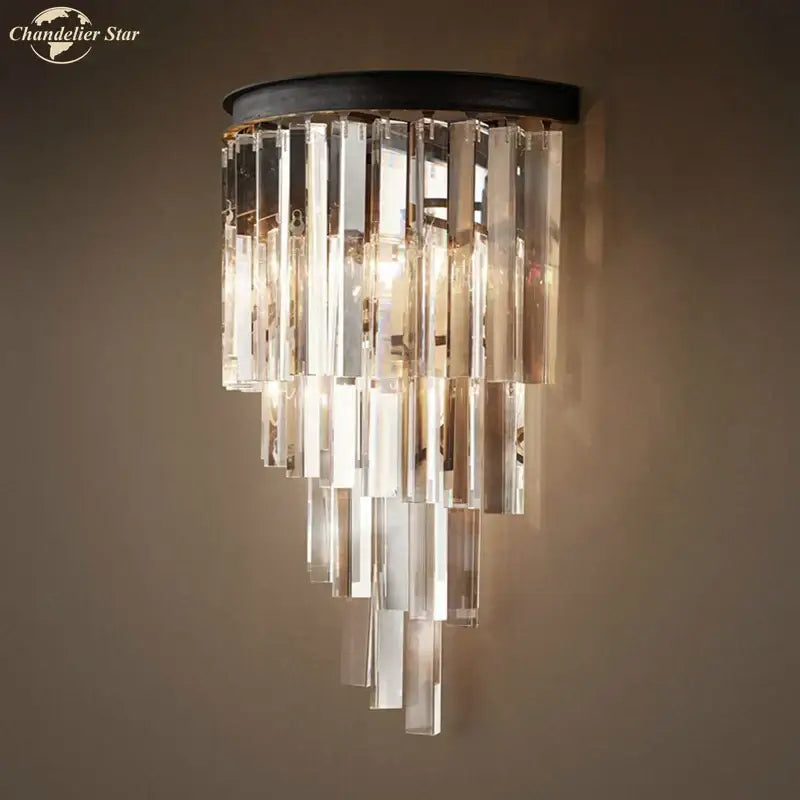 Modern black crystal wall lamp with crystal chandelier style, clear glass prisms, and black metal base for bedroom decorbites wall lamp