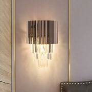 Modern black crystal wall light with vertical metallic slats and cascading crystal prisms for bedroom use