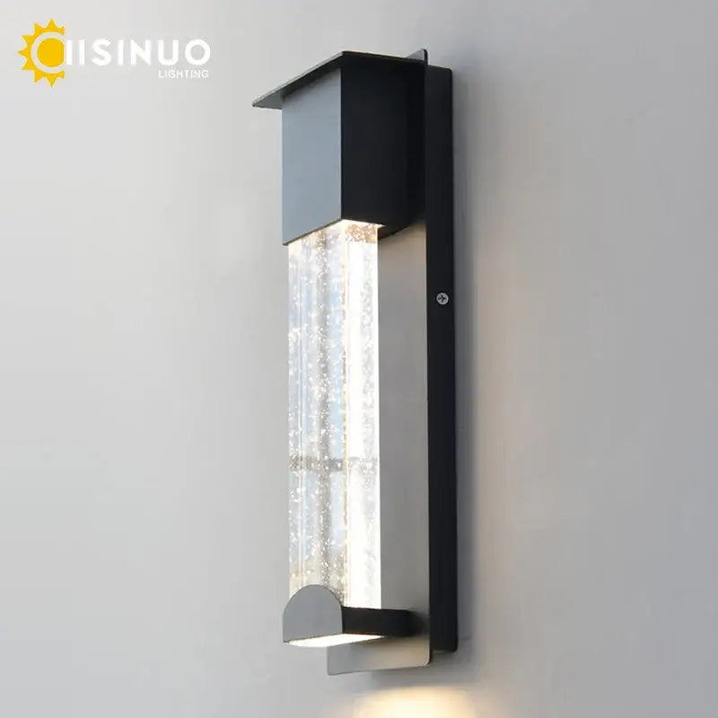 Modern black crystal wall light with pir motion sensor featuring clear textured glass panel diffusing warm led light