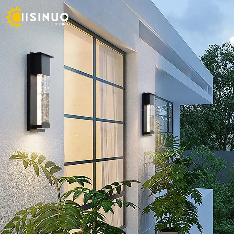Modern black crystal wall light with pir motion sensor and textured glass panel emitting warm light for outdoor use