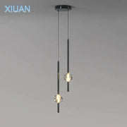 Modern black cube crystal pendant lamps feature crystal-like glass shades with sleek cylindrical metal rods for living room decorbites cube crystal lighting