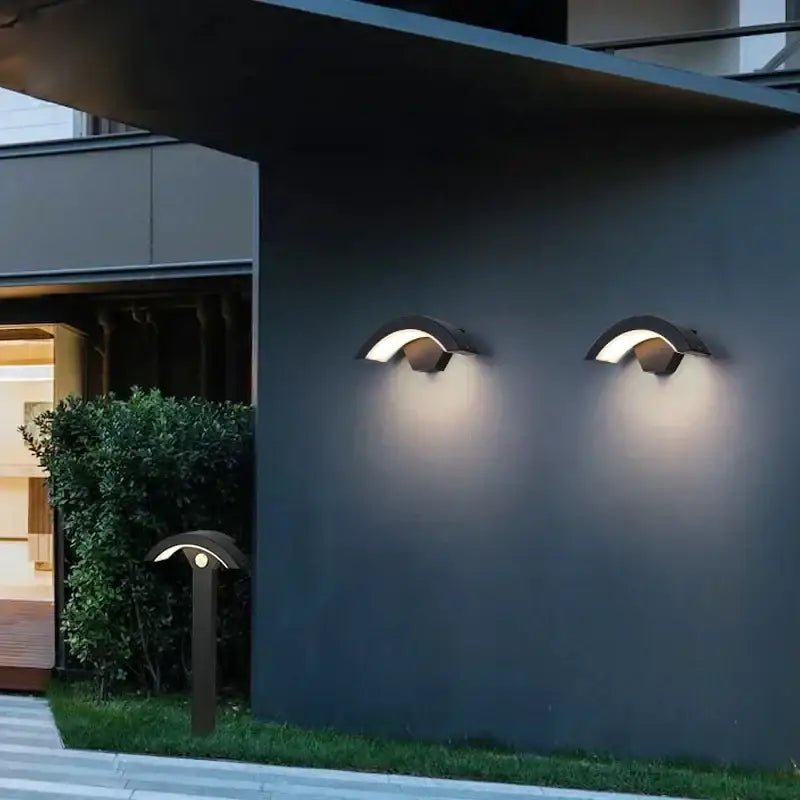 Modern black curved led waterproof outdoor wall lamp with motion sensor emitting warm white light for porch decorbites led waterproof