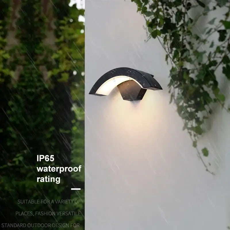 Modern black curved led waterproof outdoor wall lamp with motion sensor and warm lighting for porch decorbites led waterproof