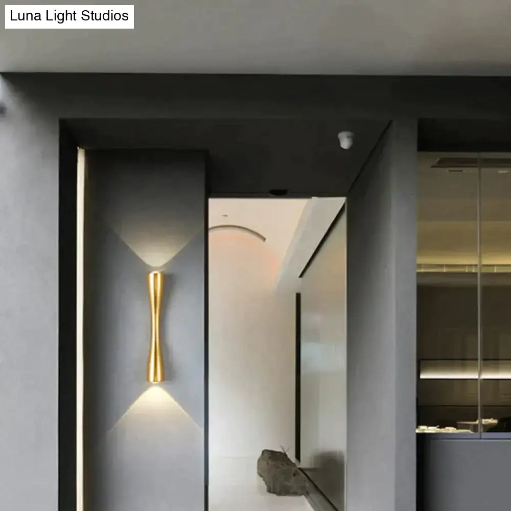 Modern black curved wall sconce with gold-toned sleek minimalist design for outdoor waterproof porch lighting