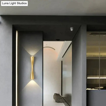 Modern black curved wall sconce with gold-toned sleek minimalist design for outdoor waterproof porch lighting