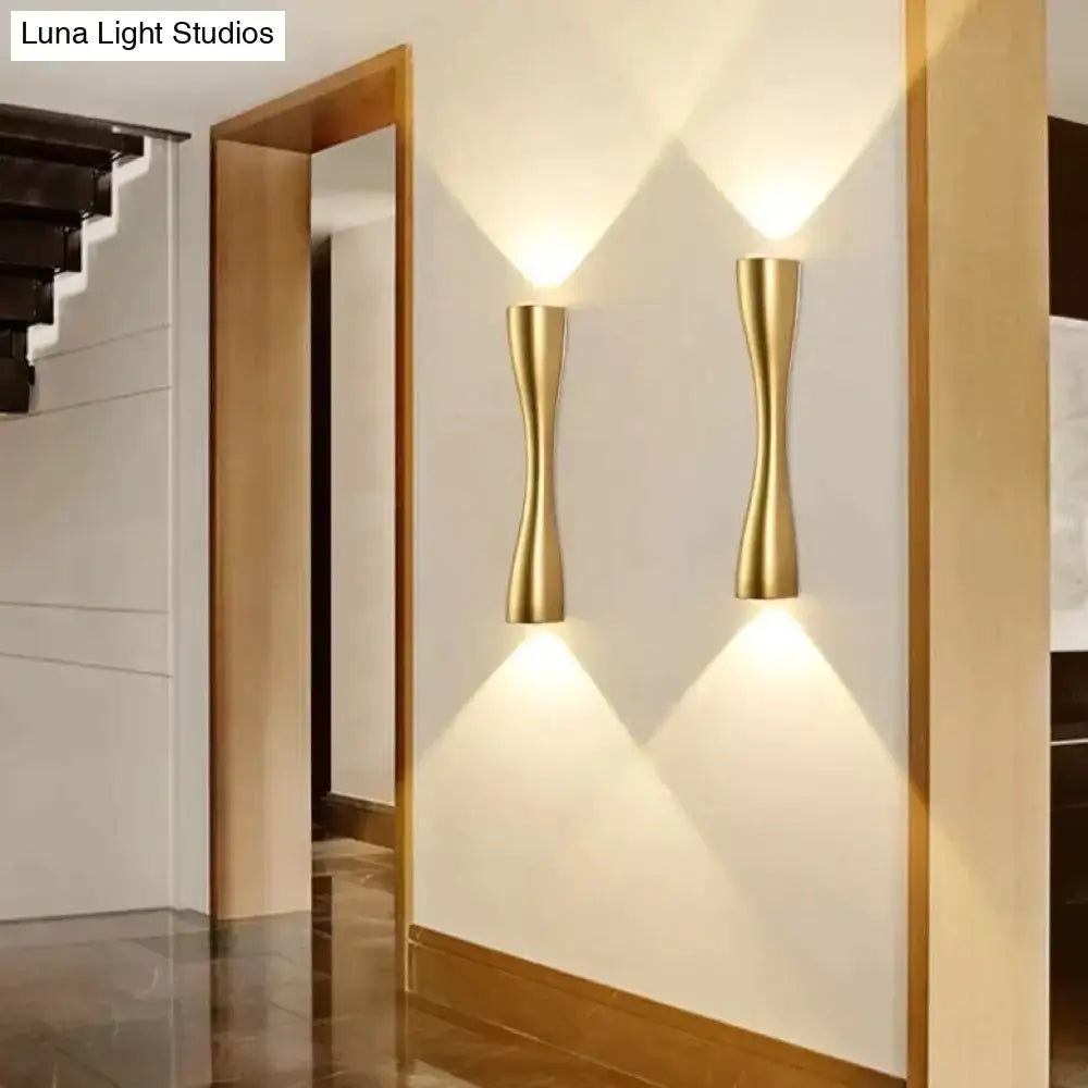 Modern black curved wall sconce with gold-toned sleek design for outdoor waterproof porch lighting