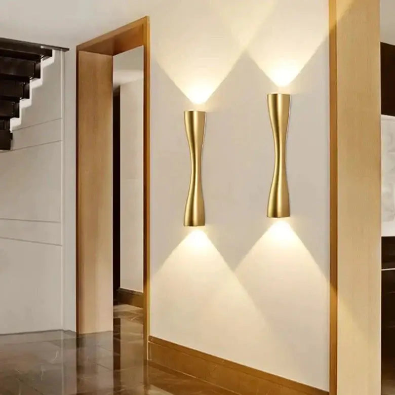 Modern black curved wall sconce with gold-toned sleek design waterproof for outdoor porch lighting