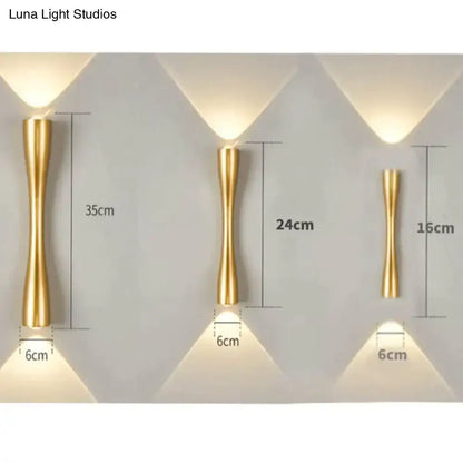 Modern black curved wall sconce with gold-colored sleek metal design for outdoor waterproof porch lighting