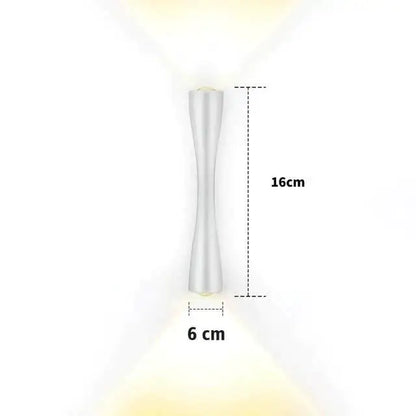 Modern black curved wall sconce outdoor porch light in sleek silver with slender hourglass design and warm led lighting