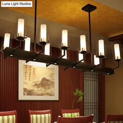 Modern black metal DecorBites™ cylinder clear glass island light with frosted glass cylinders and integrated LED lights