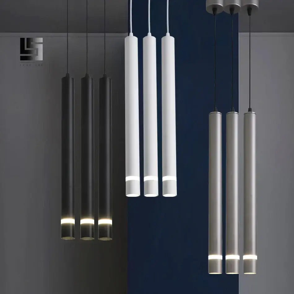 Modern black cylinder pipe pendant light with sleek metallic body and warm LED base ideal for dining room decorbites