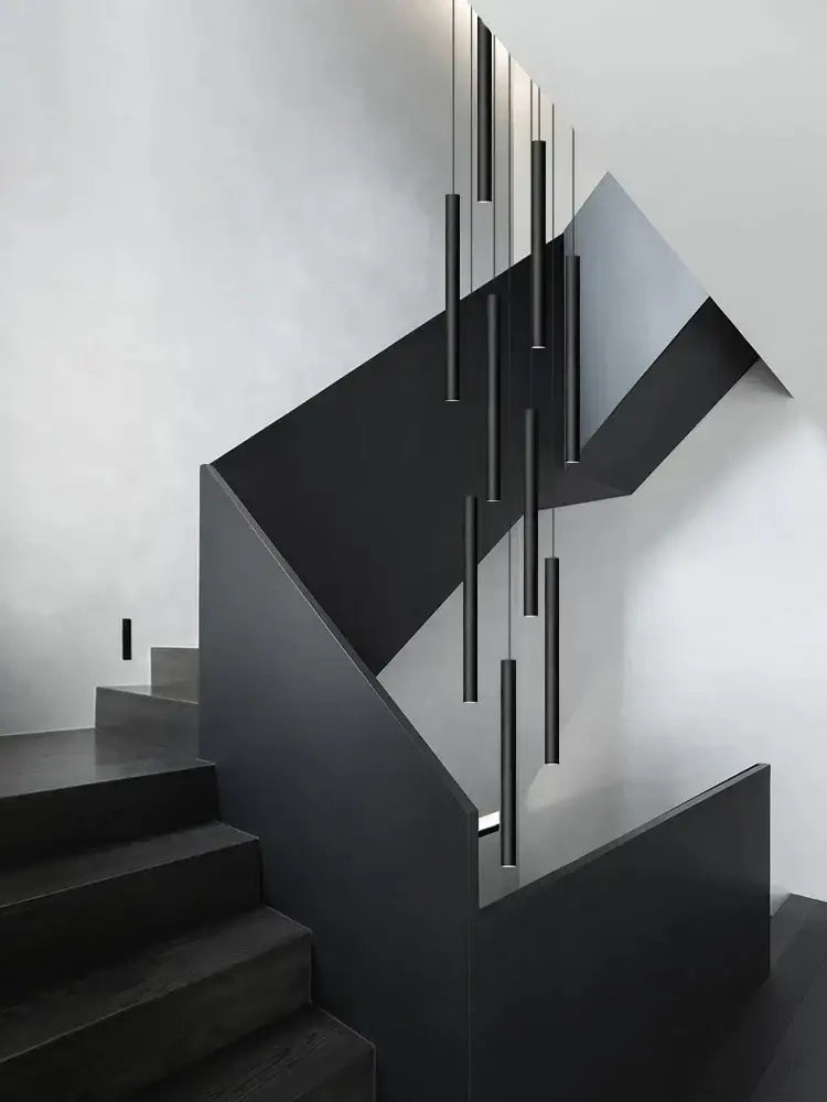 Modern black cylindrical led staircase chandelier suspension light featuring decorbites cylindrical led pendant lights