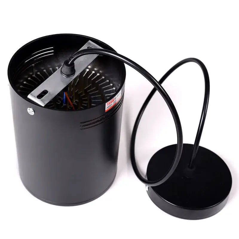 Modern black cylindrical pendant ceiling spot light with sleek design and circular base for kitchen lighting