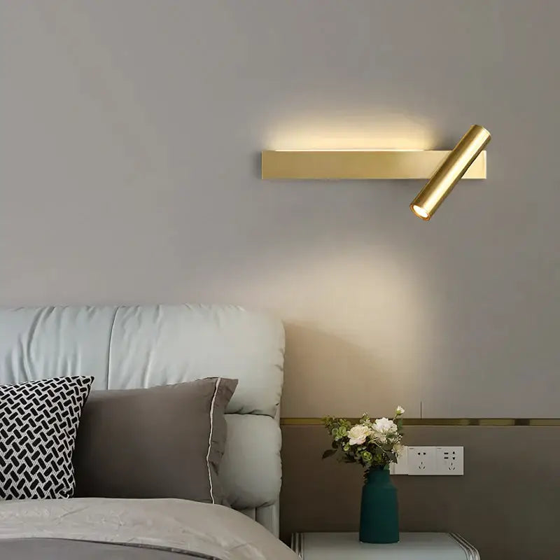 Modern black cylindrical wall light with gold-finished adjustable spotlight ideal for decorbites copper wall light decor