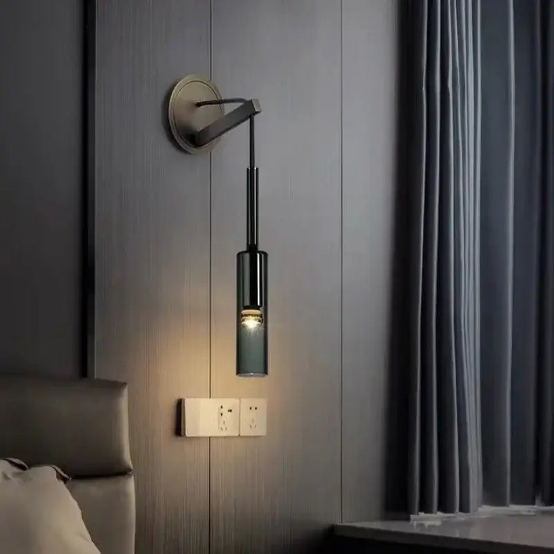 Modern black cylindrical wall sconce with frosted glass shade featuring decorbites elegant crystal design for bedroom decor