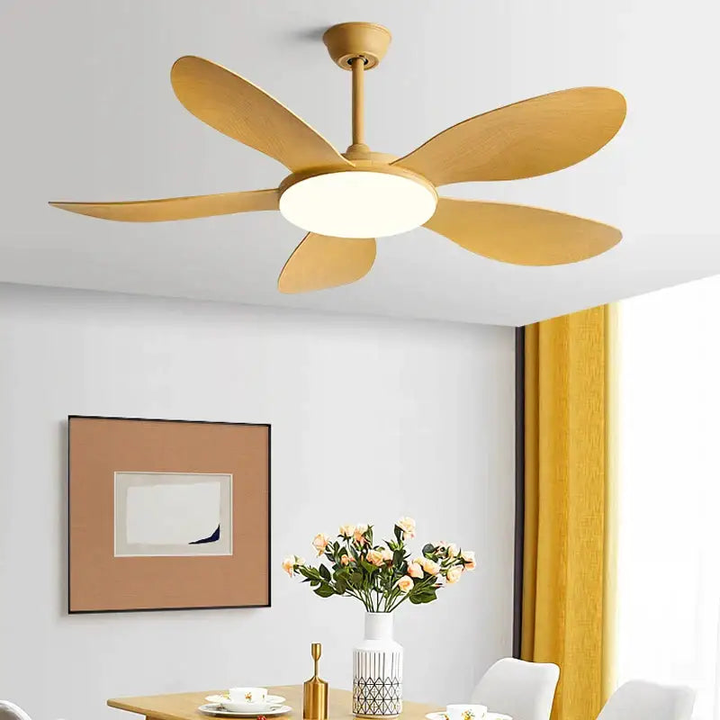 A modern black dc ceiling fan with five light wood blades and central led ceiling fan light for bedroom use