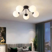 Modern black decorbites bubble glass ceiling light with five frosted white spherical glass globes for living room