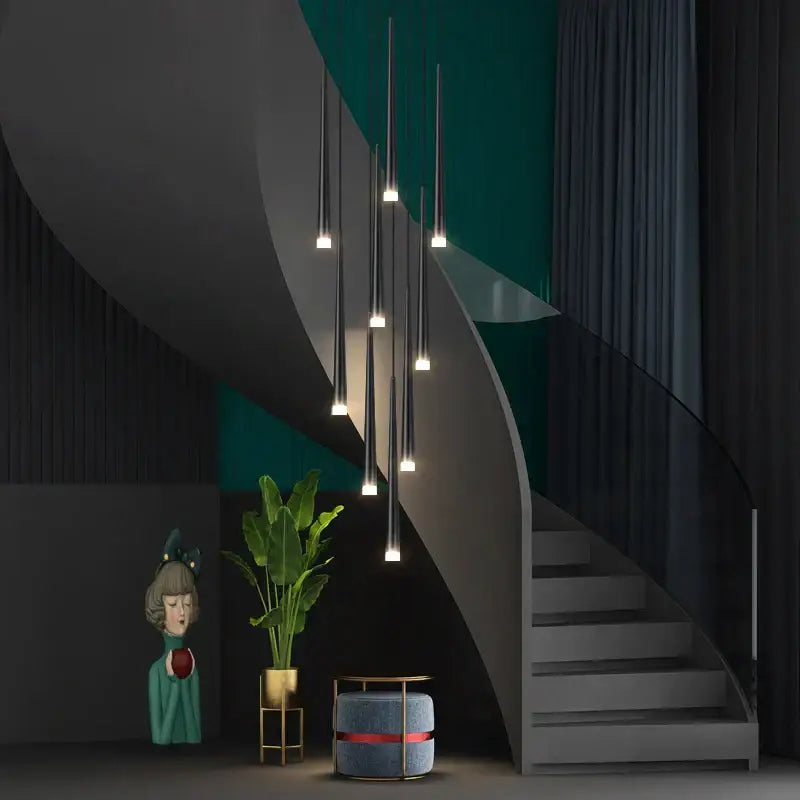 Modern black decorbites conical chandelier with slender cylindrical shades and warm bulbs for stair lighting
