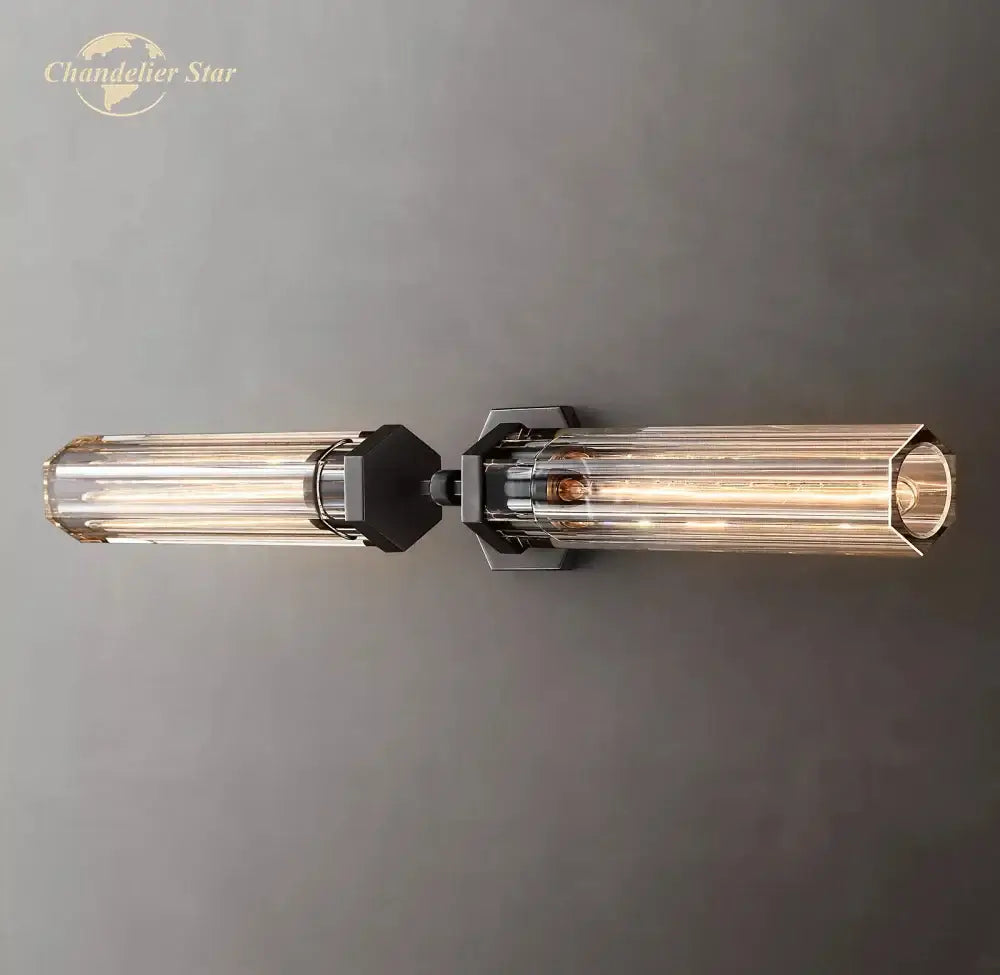 Modern black decorbites crystal hexagonal sconce with ribbed glass cylinders and filament bulbs for living room use