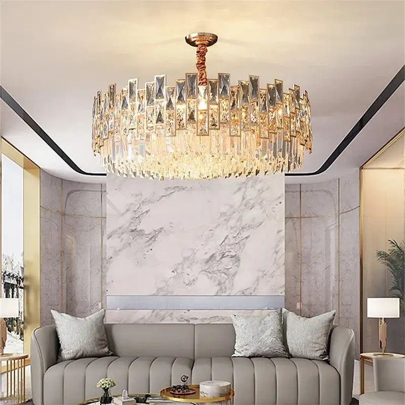 A luxurious gold-toned decorbites crystal led chandelier with cascading crystal prisms for dining room light