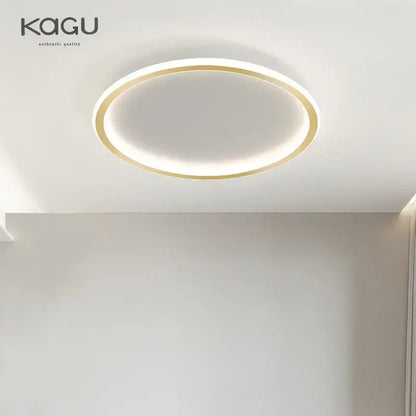 Modern black decorbites dimmable led ceiling light with white diffuser and gold-toned ring for living room decor