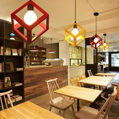Modern black decorbites geometric led pendant lights in red and yellow with exposed bulbs for kitchen lighting