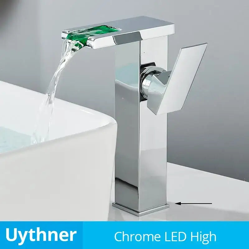 Modern black decorbites led waterfall bathroom sink faucet with chrome finish and green led accent at the spout