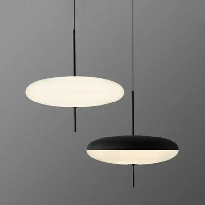Minimalist modern black designer iron pendant light with sleek rods and oval shades for dining room and bar decorbites designer iron pendant