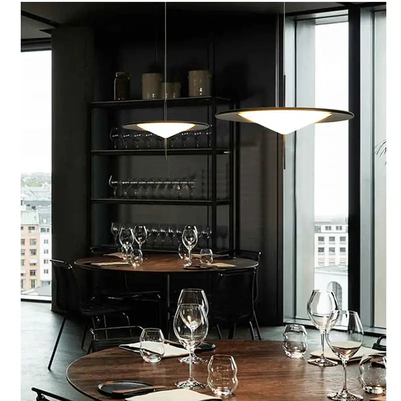 Modern black designer ufo chandelier with sleek circular white shades and thin metallic frames for living room decorbites designer ufo